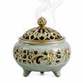 Bruciatore per incenso diametro 18 cm in ceramica verde salvia e metallo dorato traforato stile classico